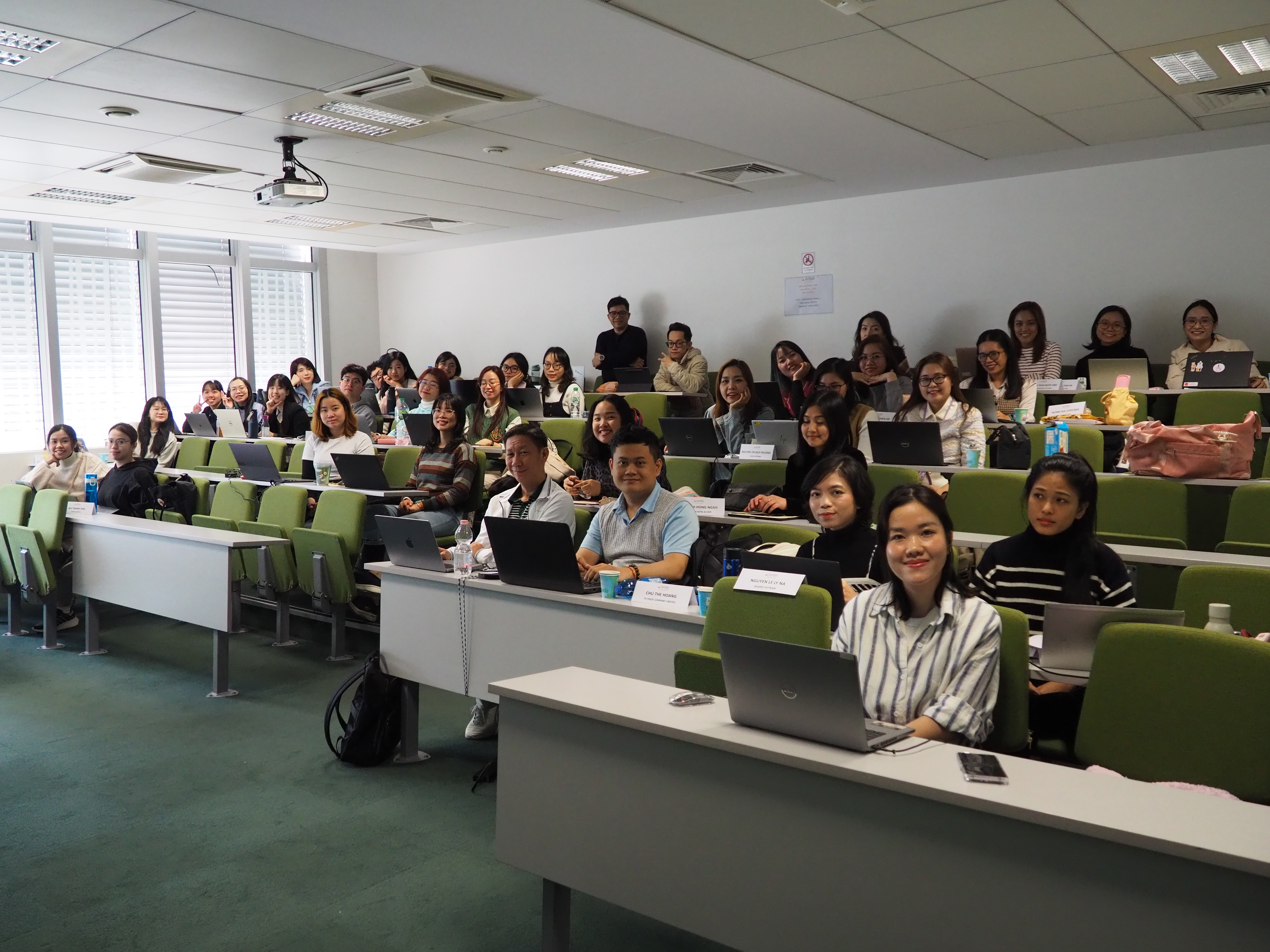 Vietnamese students photographed in an amphitheatre at IAE Paris-Sorbonne