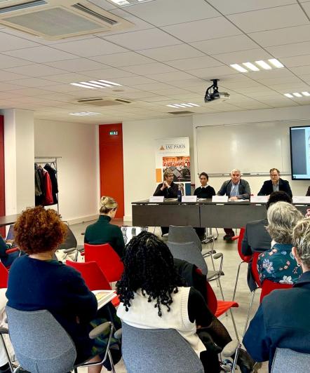 photos of people sitting on chairs with their backs to the camera, facing the directors and members of the executive committee